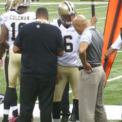 Morstead talking to trainers about his right leg.