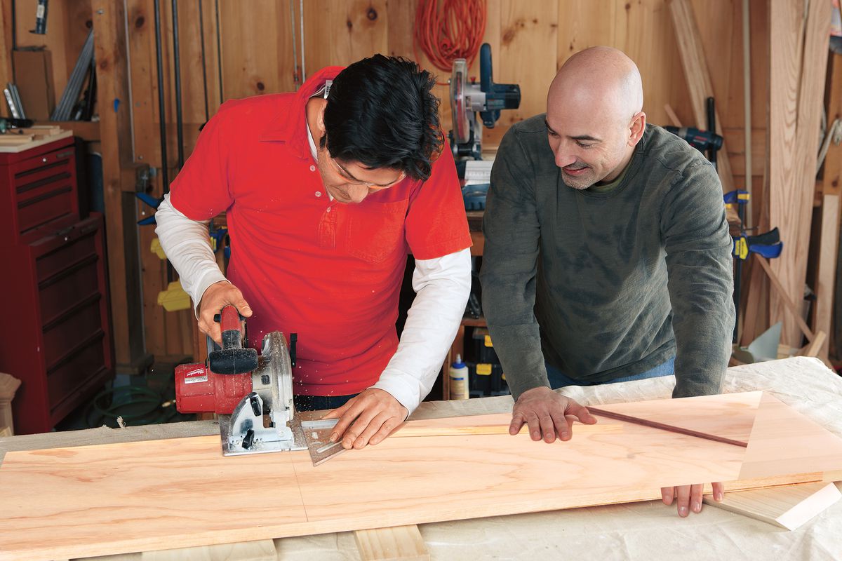 Men Cut Boards Of Oak Bar Top