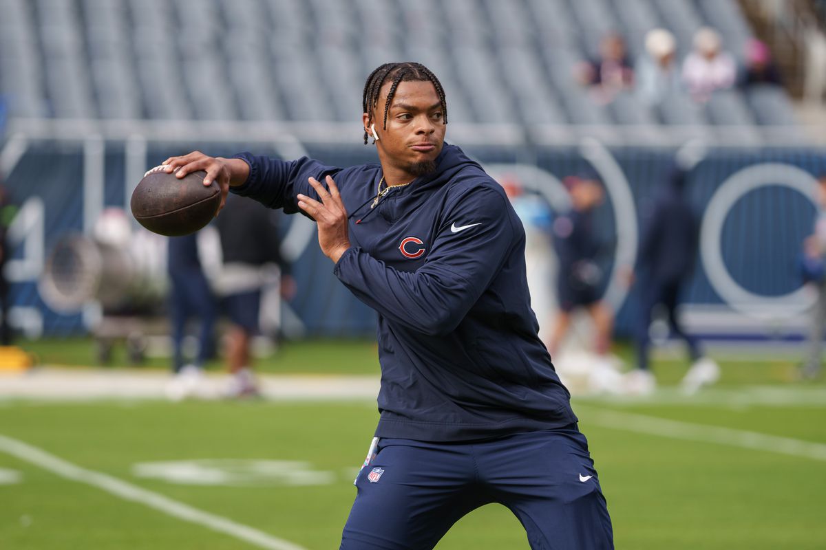 Quarterback Justin Fields of the Chicago Bears warms up prior to an NFL football game against the Minnesota Vikings at Soldier Field on October 15, 2023 in Chicago, Illinois.