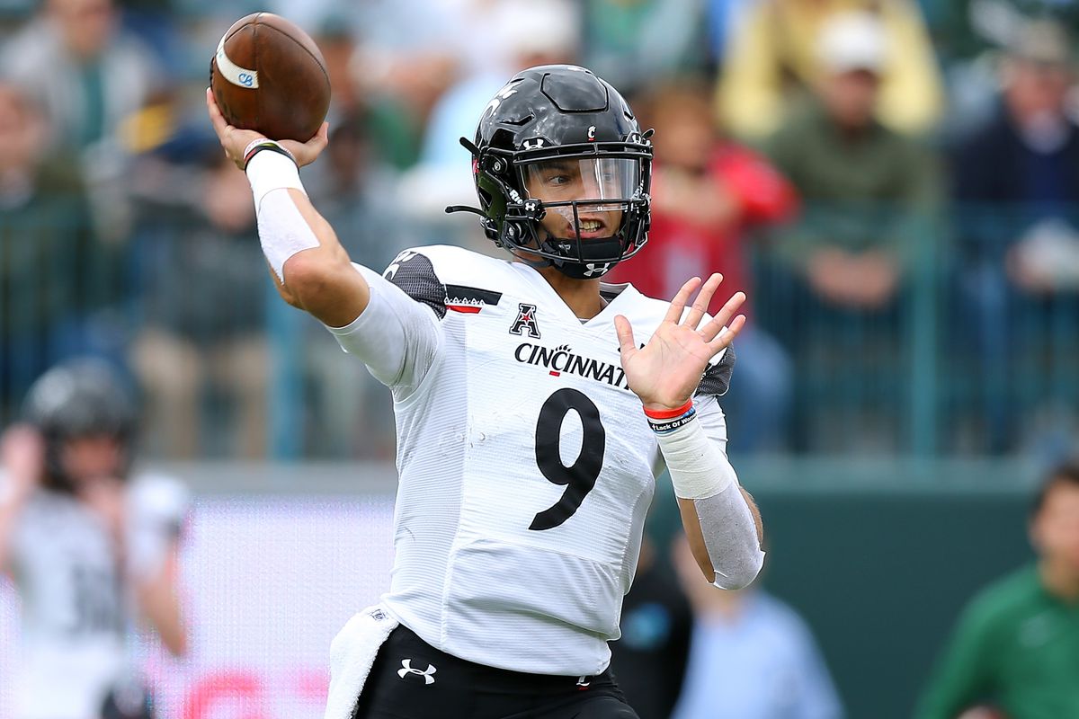 Desmond Ridder of the Cincinnati Bearcats throws the ball during the first half against the Tulane Green Wave at Yulman Stadium on October 30, 2021 in New Orleans, Louisiana.