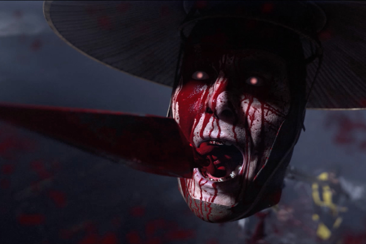 A close up of Raiden’s head from Scorpion’s fatality in the closing moments of the reveal trailer for MK11.