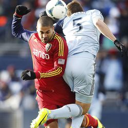 Real's Alvaro Saborio and Kansas City's Matt Besler go after the ball as Real Salt Lake and Sporting KC play Saturday, Dec. 7, 2013 in MLS Cup action.