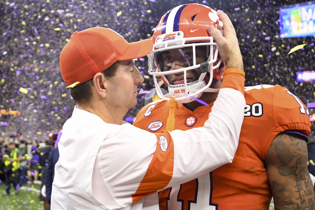 Head coach Dabo Swinney of the Clemson Tigers embraces Isaiah Simmons during the College Football Playoff National Championship held at the Mercedes-Benz Superdome on January 13, 2020 in New Orleans, Louisiana.