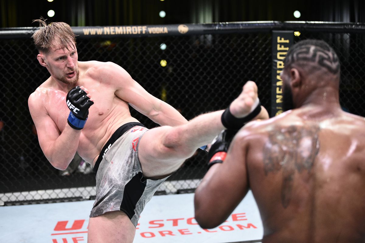 Alexander Volkov of Russia kicks Curtis Blaydes in their heavyweight bout during the UFC Fight Night event at UFC APEX on June 20, 2020 in Las Vegas, Nevada.
