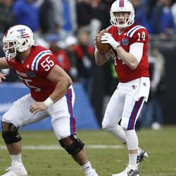 Louisiana Tech quarterback Ryan Higgins (14) looks to pass against Navy during first half of the Armed Forces Bowl NCAA college football game, Friday, Dec. 23, 2016, in Fort Worth, Texas. (AP Photo/Jim Cowsert)
