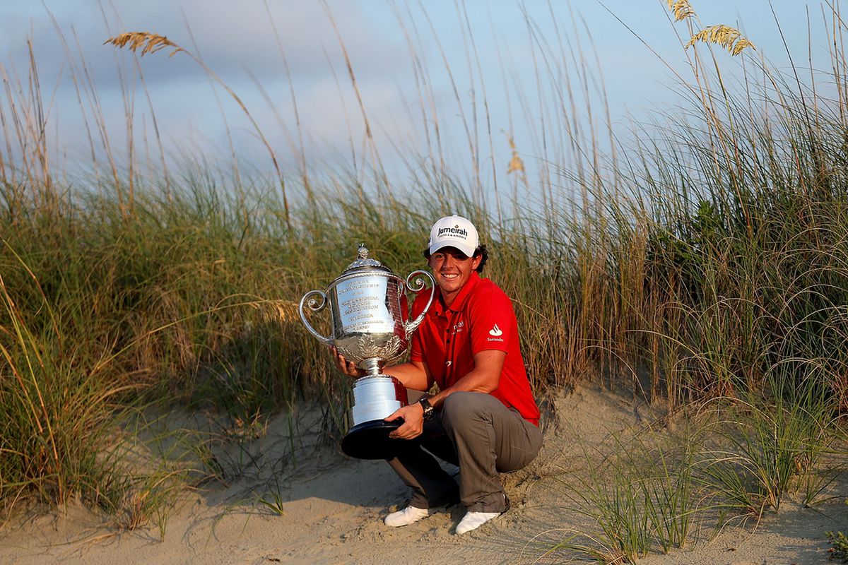 KIAWAH ISLAND, SC - AUGUST 12: Rory McIlroy of Northern Ireland holds up the Wanamaker Trophy after winning the 94th PGA Championship at the Ocean Course on August 12, 2012 in Kiawah Island, South Carolina. (Photo by David Cannon/Getty Images)