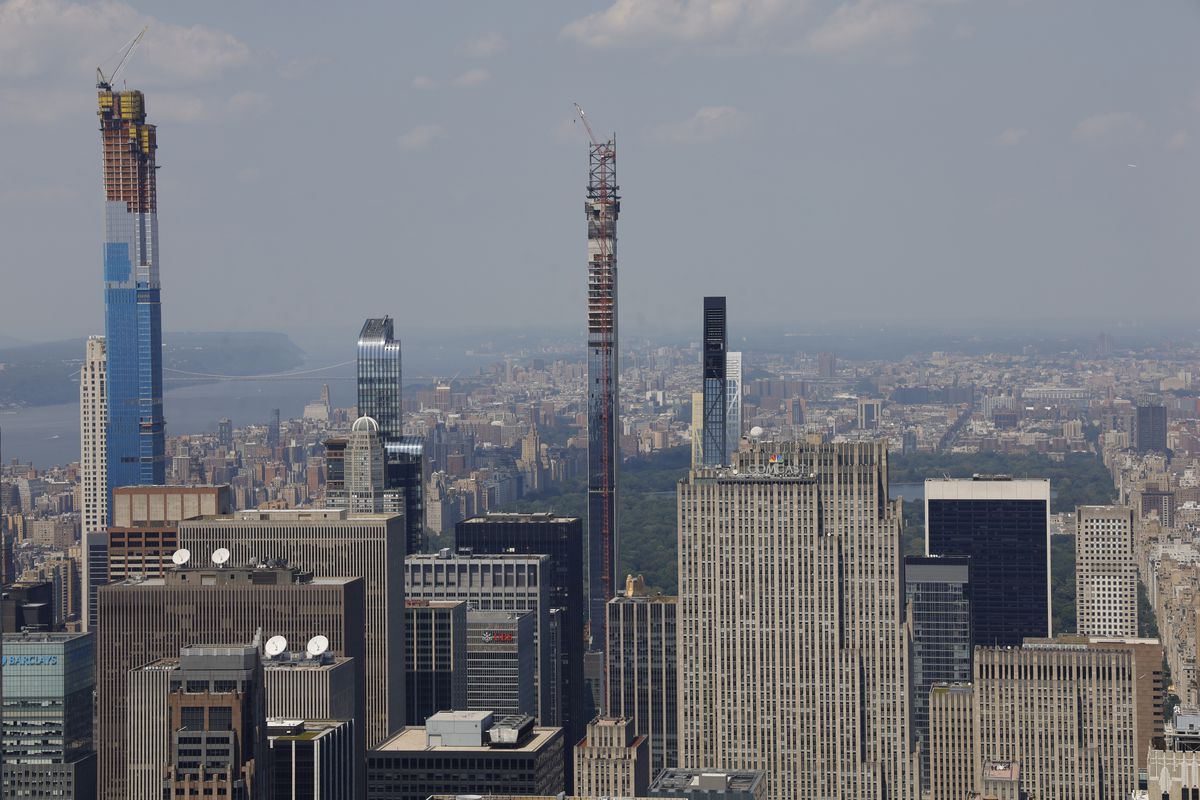Three supertall, skinny skyscrapers jut out of the midtown skyline.