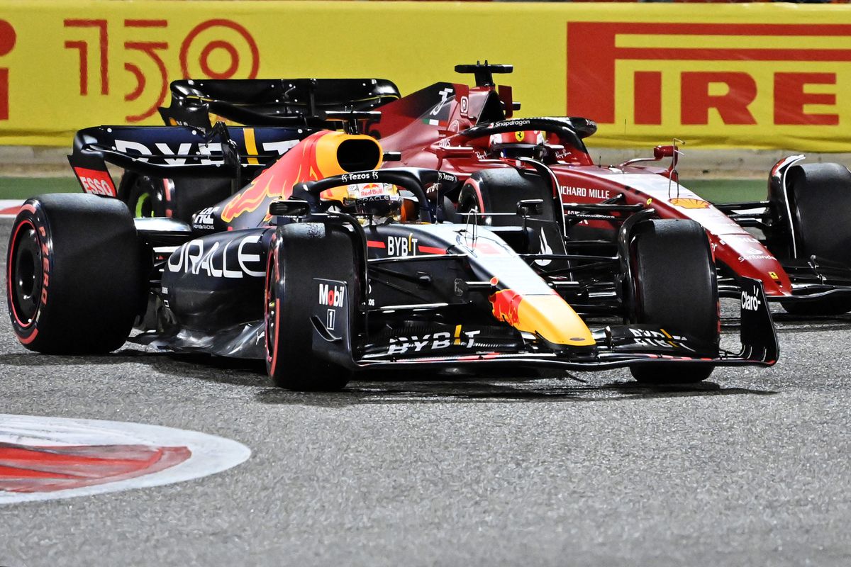 Max Verstappen of the Netherlands driving the (1) Oracle Red Bull Racing RB18 overtakes Charles Leclerc of Monaco driving (16) the Ferrari F1-75 during the F1 Grand Prix of Bahrain at Bahrain International Circuit on March 20, 2022 in Bahrain, Bahrain.