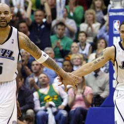 Carlos Boozer #5 of the Utah Jazz and Deron Williams #8 of the Utah Jazz at mid court at the Jazz-Nuggets play in game 3 of the Western Conference Playoffs in Energy Solutions Arena.  Friday, April 23, 2010. Photo by Scott G Winterton Deseret News.
