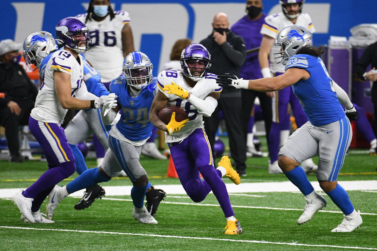 Vikings wide receiver Justin Jefferson (18) runs with the ball against the Detroit Lions during the third quarter at Ford Field.&nbsp;