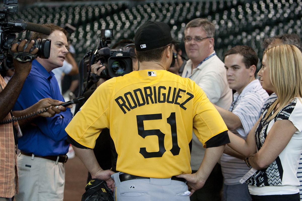 HOUSTON TX - JULY 26:  Wandy Rodriguez #51 of the Pittsburgh Pirates speaks with the media as he returns to Houston as a Pittsburgh Pirate at Minute Maid Park on July 26, 2012 in Houston, Texas. (Photo by Bob Levey/Getty Images)