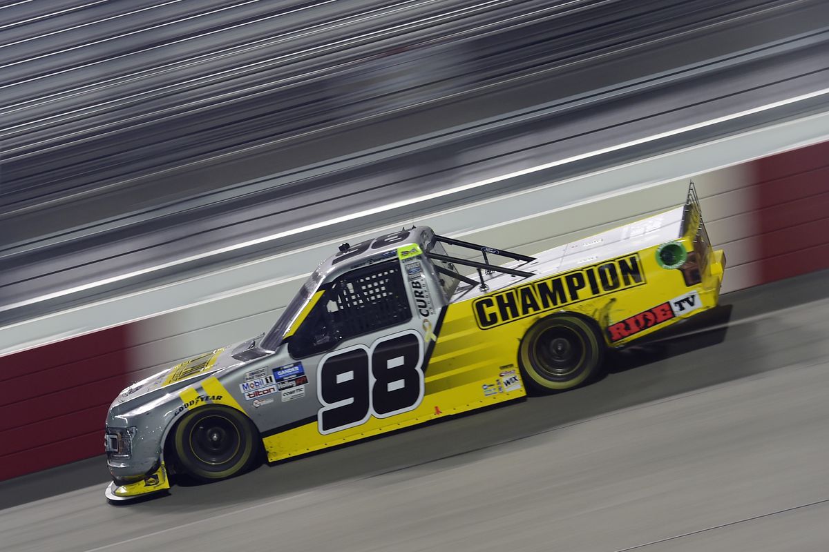 Grant Enfinger, driver of the #98 Champion/Curb Records Ford, drives during the NASCAR Gander Outdoors Truck Series ToyotaCare 250 at Richmond Raceway on September 10, 2020 in Richmond, Virginia.