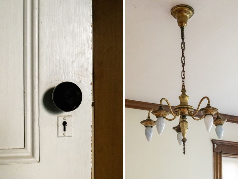 Original details, like doors and chandeliers at the West Roxbury project house