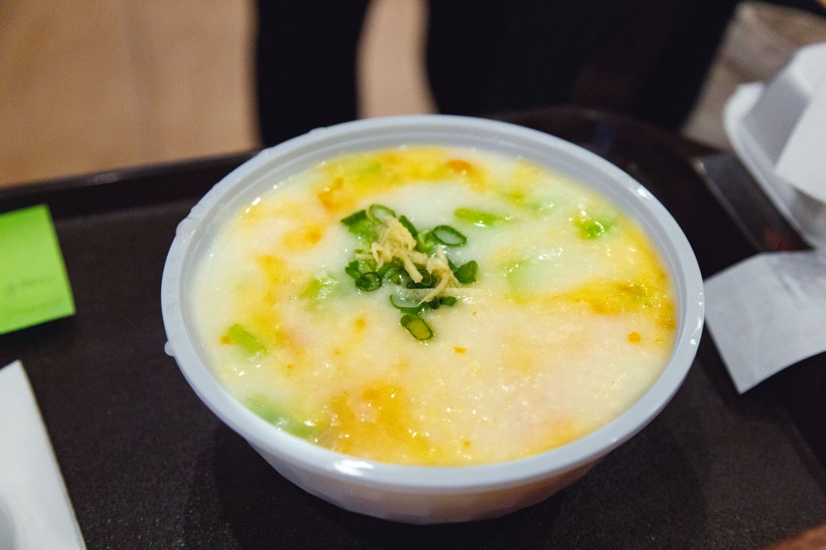 E Noodle House’s mustard green and pumpkin congee