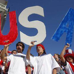 Fans cheer as they get ready for the United States and Honduras to play Tuesday, June 18, 2013 at Rio Tinto Stadium.
