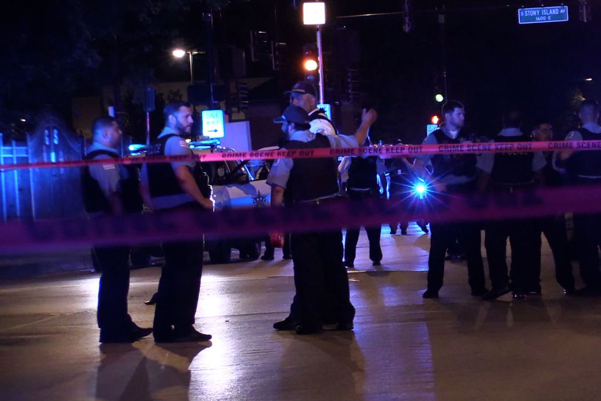 Chicago police investigate the scene where 5 people where shot July 5.