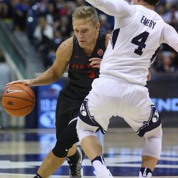 Brigham Young - Hawaii guard Tanner Nelson (3) works to get around Brigham Young Cougars guard Nick Emery (4) as BYU and BYU-Hawaii play in preseason action at the Marriott Center in Provo on Wednesday, Nov. 9, 2016.