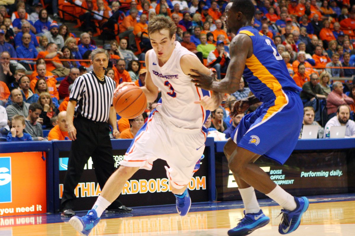 Jan 25, 2014; Boise, ID, USA; Boise State Broncos guard/forward Anthony Drmic (3) drives against San Jose State Spartans forward Jaleel Williams. (2) during the second half at Taco Bell Arena. Boise State defeated San Jose State 76-55. 