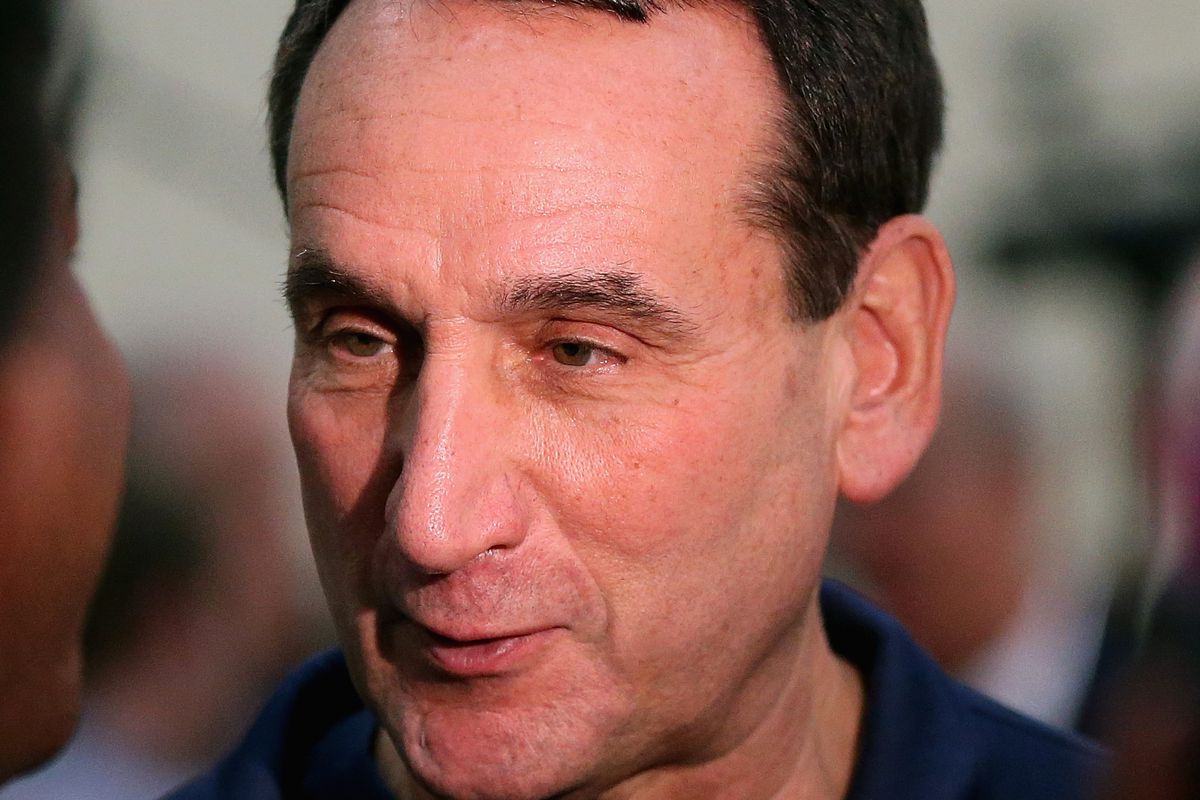 Head coach Mike Krzyzewski of the USA Basketball National team, speaks to the media following a USA basketall training session at Quest MultiSport Complex on August 15, 2014 in Chicago, Illinois