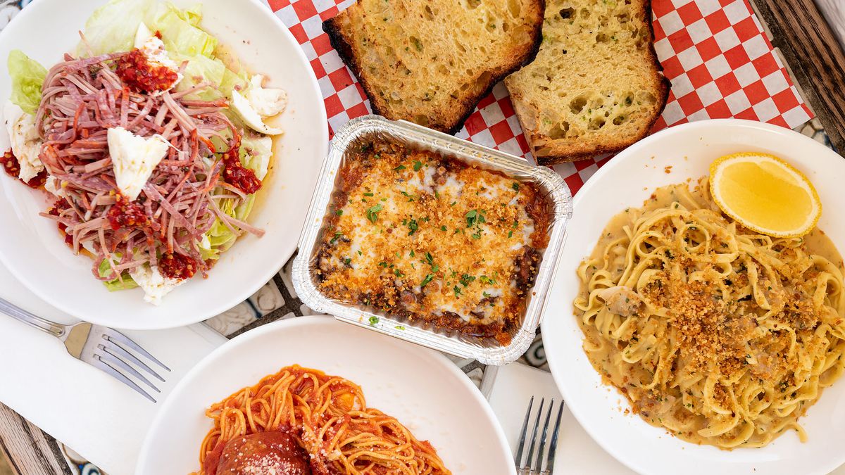 Dishes from Sunday Gravy in Inglewood, California, including spaghetti and meatballs