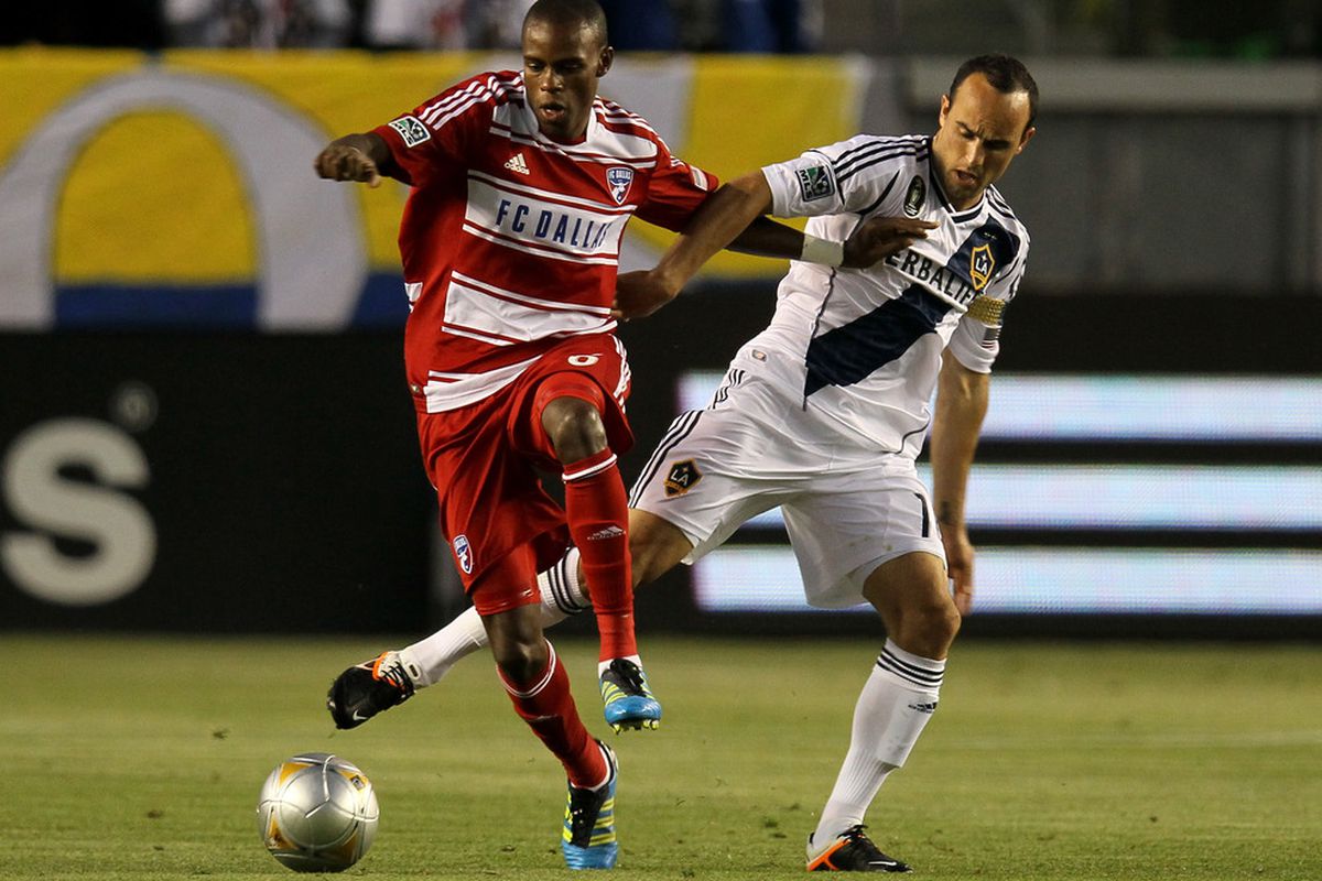 CARSON, CA - APRIL 28:  Landon Donovan #10 of the Los Angeles Galaxy fights for the ball against Jackson #6 of FC Dallas at The Home Depot Center on April 28, 2012 in Carson, California.  (Photo by Stephen Dunn/Getty Images)