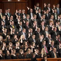 Members of the choir take part in the sustaining vote during the afternoon session Saturday, April 6, 2013 of the 183th Annual General Conference of The Church of Jesus Christ of Latter-day Saints in the Conference Center.