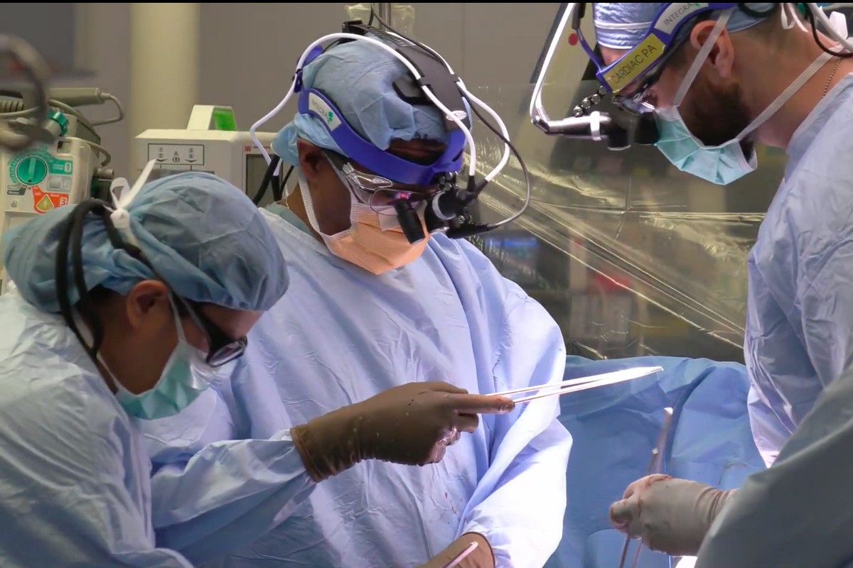 Doctors perform a heart transplant Thursday at the University of Chicago Medical Center.