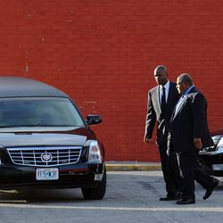 Dec 5, 2012; Kansas City, MO, USA; Kansas City Chiefs head coach Romeo Crennel and media relations staff member Ted Crews leave after the memorial service for Jovan Belcher at the International Deliverance and Worship Center.