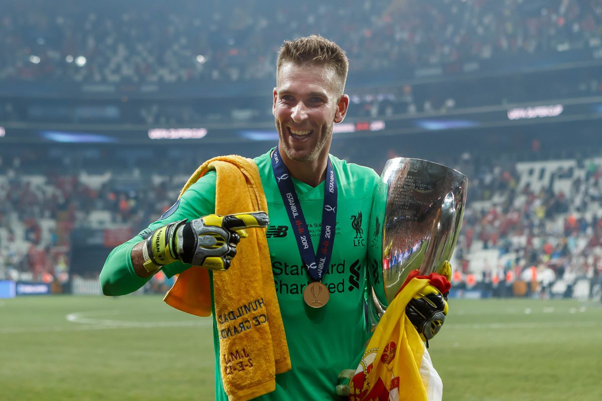 Goalkeeper Adrian of Liverpool FC celebrates with the trophy after winning the UEFA Super Cup match between FC Liverpool and FC Chelsea at Vodafone Park on August 14, 2019 in Istanbul, Turkey.