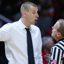 Utah Valley Wolverines head coach Mark Pope disputes a call that gave Utah possession of the ball in the final moments of the game at the Huntsman Center in Salt Lake City on Tuesday, Dec. 6, 2016.