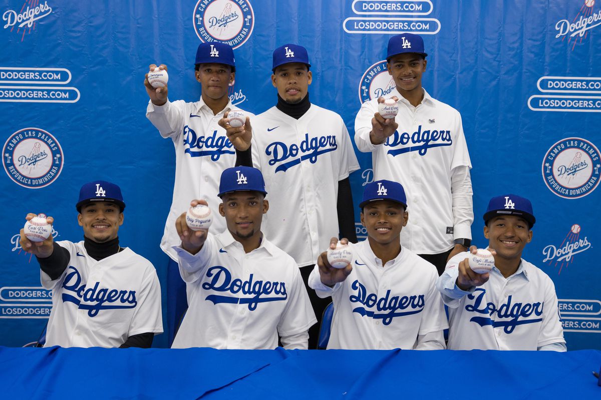 Some of the Dodgers international signings from the Dominican Republic on January 15, 2024. From left to right starting on top: pitcher Alexis Dominguez, shortstop Emil Morales, pitcher Axel Perez, catcher Euri Rosa, outfielder Rafy Peguero, shortstop Heudy Peña, and infielder Reyli Mariano.