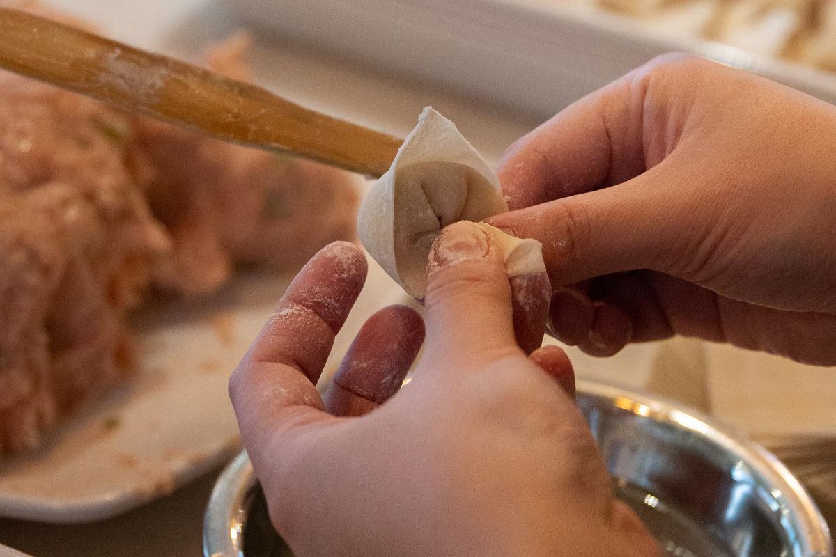 hand folding dumpling