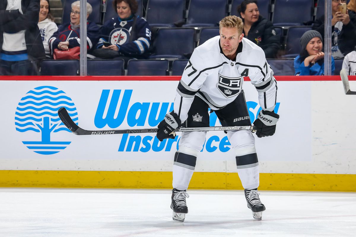 WINNIPEG, MB - FEBRUARY 18: Jeff Carter #77 of the Los Angeles Kings takes part in the pre-game warm up prior to NHL action against the Winnipeg Jets at the Bell MTS Place on February 18, 2020 in Winnipeg, Manitoba, Canada.