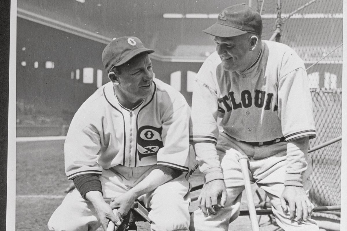 Rogers Hornsby and Jimmy Dykes Sitting Together Before Baseball Game