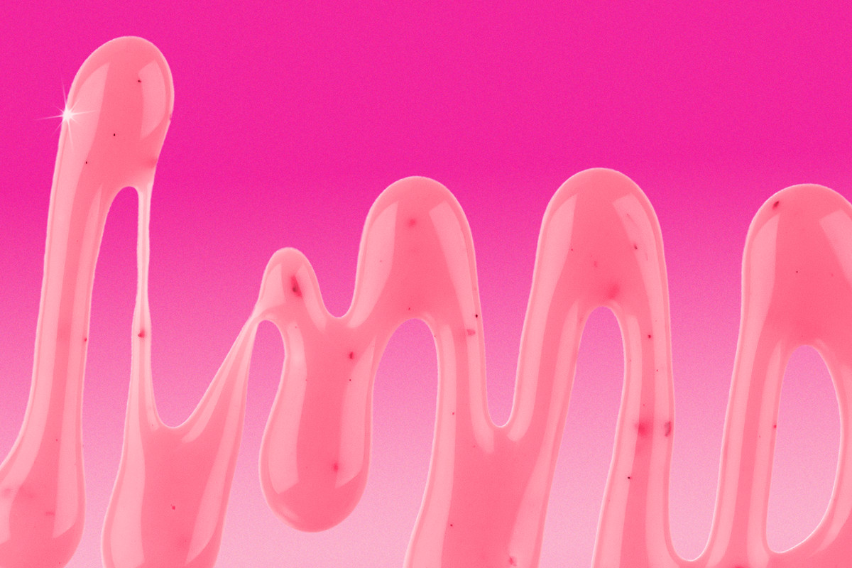 A squirt of pink sauce on a pink background