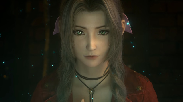A brown haired girl with bright green eyes, Aerith, stares with dim green light on her face in Final Fantasy 7 Remake