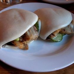 [Steamed pork buns from Momofuku Noodle Bar. By <a href="http://www.flickr.com/photos/bom_mot/157044813/in/pool-eater">LaTur</a>.]