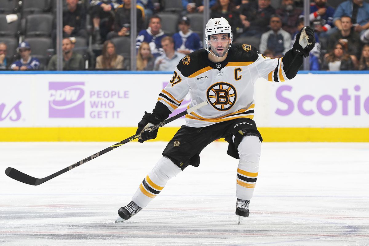Patrice Bergeron #37 of the Boston Bruins skates against the Toronto Maple Leafs during an NHL game at Scotiabank Arena on November 5, 2022 in Toronto, Ontario, Canada. The Maple Leafs defeated the Bruins 2-1.