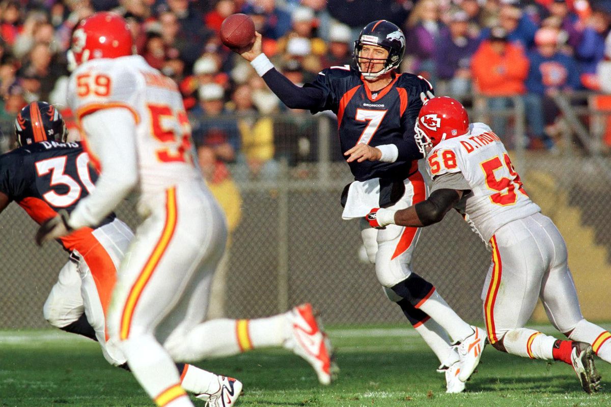 Denver Broncos quarterback John Elway (7) throws u