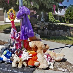 Ribbons and gifts from well-wishers adorned the outside of the Newbold home at 2370 West and 7095 South  where 6-year-old Sierra Newbold was taken from in the early morning of June 26 and her body was found next to a canal several hundred yards away Tuesday, July 10, 2012, in West Jordan, Utah. 
