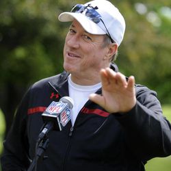 Jim Kelly gestures to the media during a press conference in Batavia, N.Y. , Monday June 3, 2013. Kelly says he has been diagnosed with cancer in his upper jaw bone and will have surgery on June 7. 