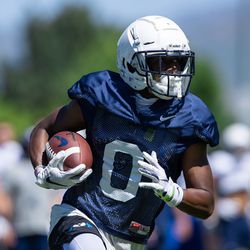 BYU wide receiver Kody Epps runs with the ball during practice on Monday, Aug. 10, 2020.