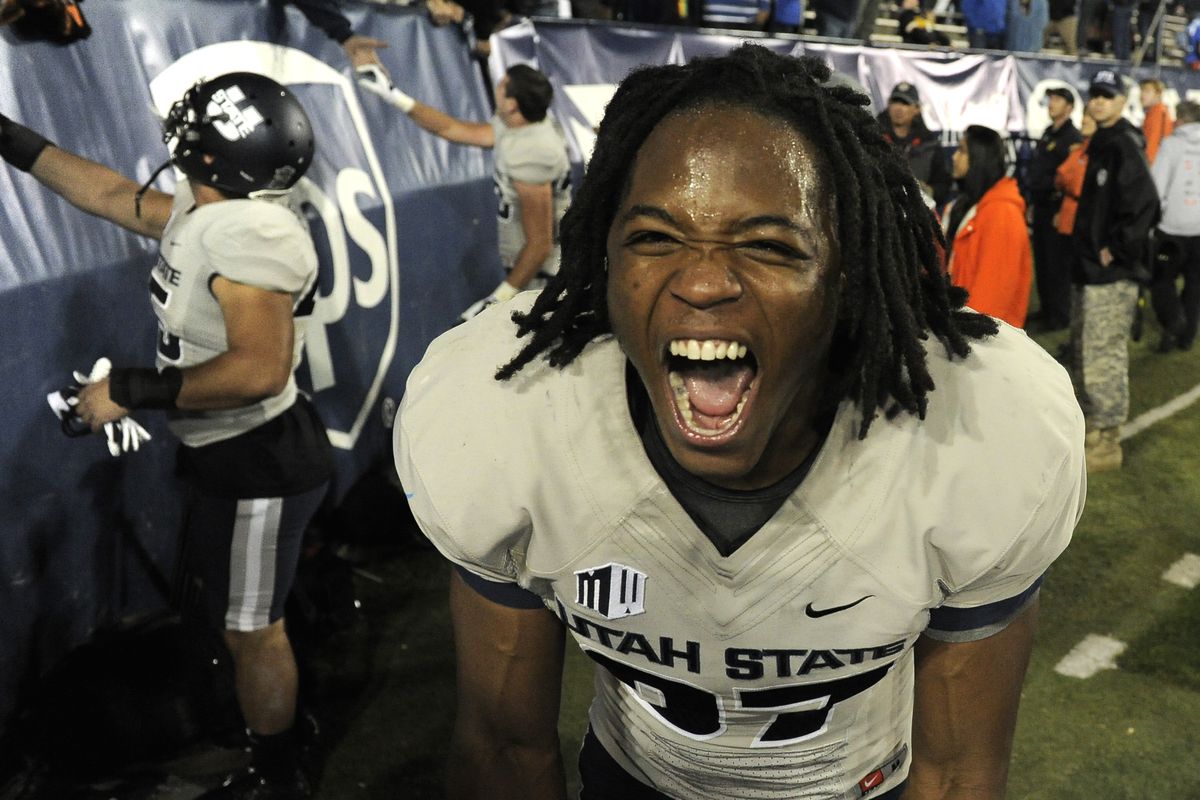 Devin Centers celebrates the Aggies' 35-20 victory over BYU in Provo.