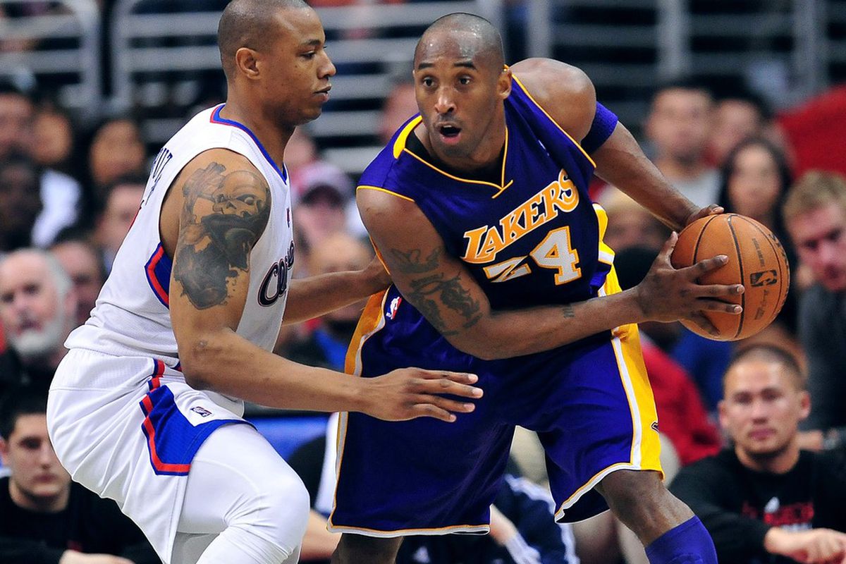April 4, 2012; Los Angeles, CA, USA; Los Angeles Lakers shooting guard Kobe Bryant (24) controls the ball against the Los Angeles Clippers during the second half at Staples Center. Mandatory Credit: Gary A. Vasquez-US PRESSWIRE