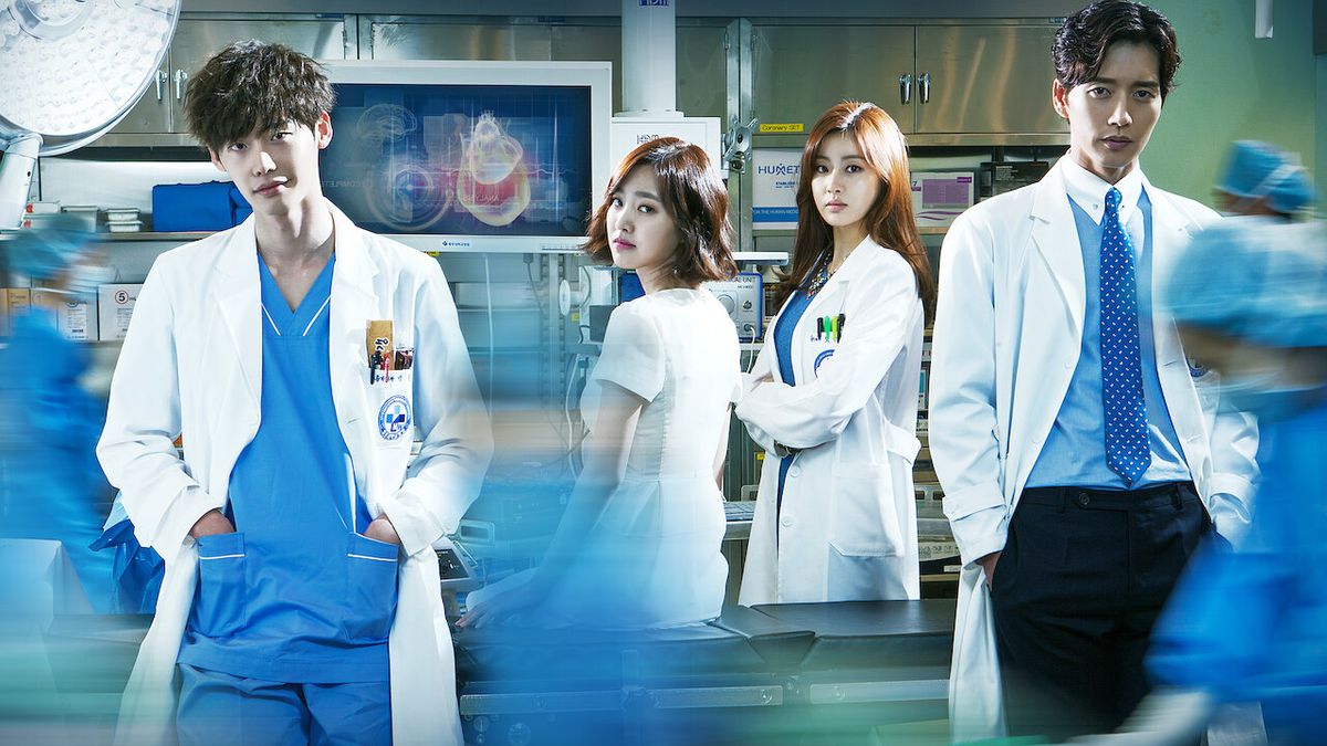 A group of doctors in blue scrubs and white overcoats stand next to each other in Doctor Stranger, while blue blurs appear across the screen.
