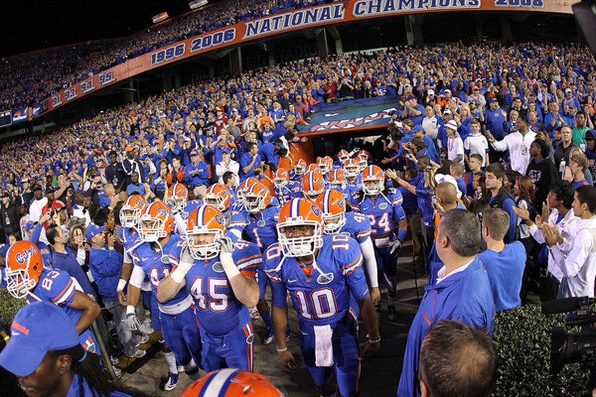 GAINESVILLE FL - NOVEMBER 13:  The Florida Gators enter the field during a game against the South Carolina Gamecocks at Ben Hill Griffin Stadium on November 13 2010 in Gainesville Florida.  (Photo by Mike Ehrmann/Getty Images)