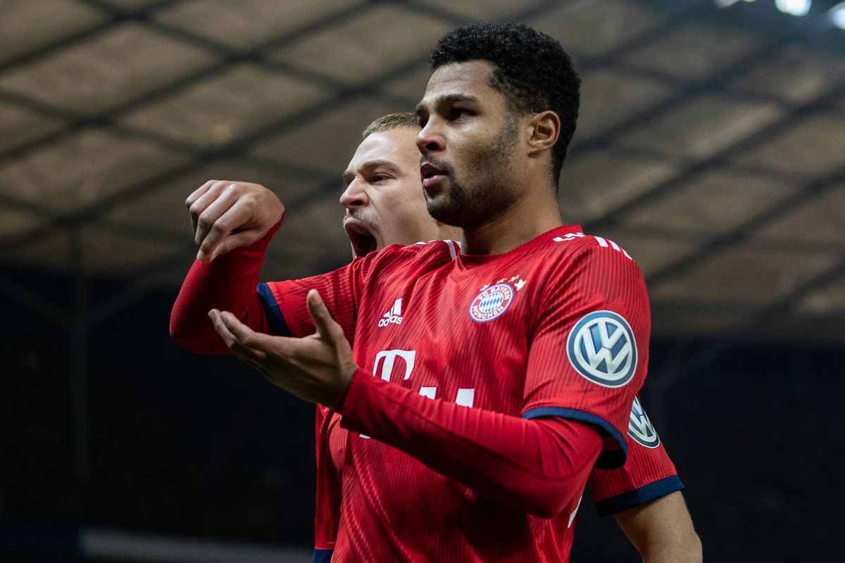 BERLIN, GERMANY - FEBRUARY 06: Serge Gnabry of FC Bayern Muenchen celebrates with team mates after scoring his team's second goal during the DFB Cup match between Hertha BSC and FC Bayern Muenchen at Olympiastadion on February 06, 2019 in Berlin, Germany. 