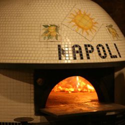 <b>Paulie Gee's</b>: Pie man <b>Paulie Gee</b> decorated his Ferrara oven with the name of the city that invented and mastered the 12'' puffy crust pizza .  It also rocks some pretty awesome Summer of Love artwork.  Paulie might secretly be an ex-hippy. L