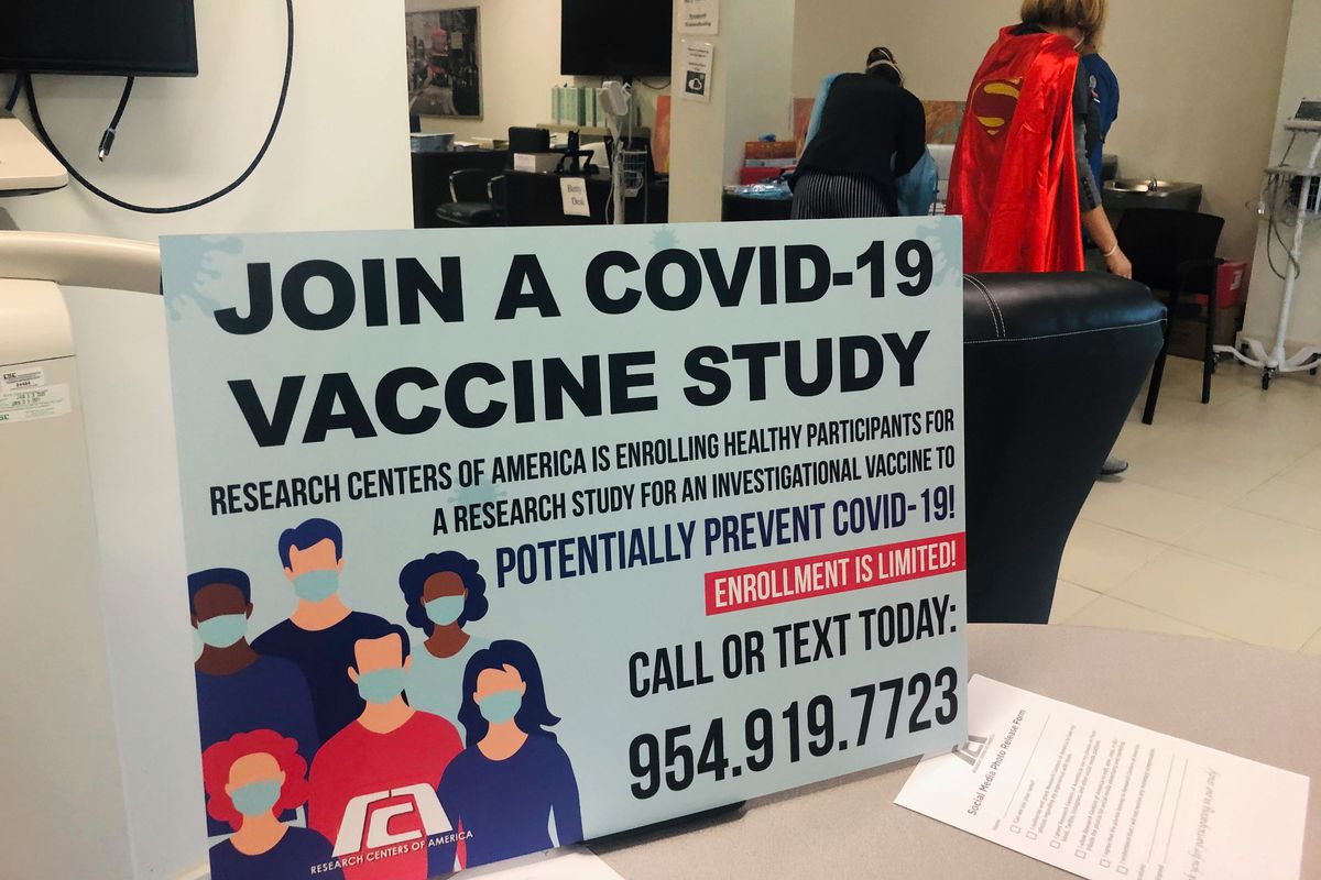 A sign is seen at the Research Centers of America, on August 18, 2020 during the phase 3 Covid-19 trial of the Moderna vaccine in Hollywood, Florida.