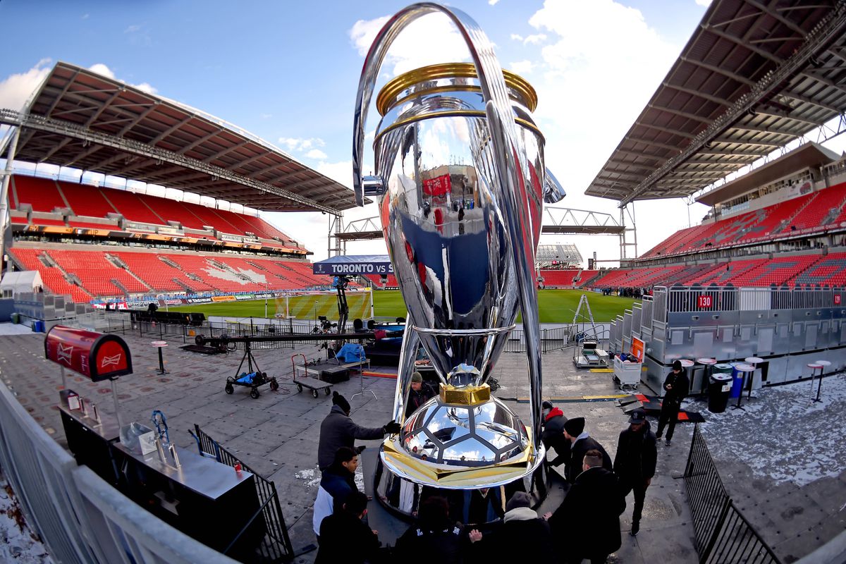 A giant replica of the Philip F. Anschutz trophy is positioned at BMO Field.